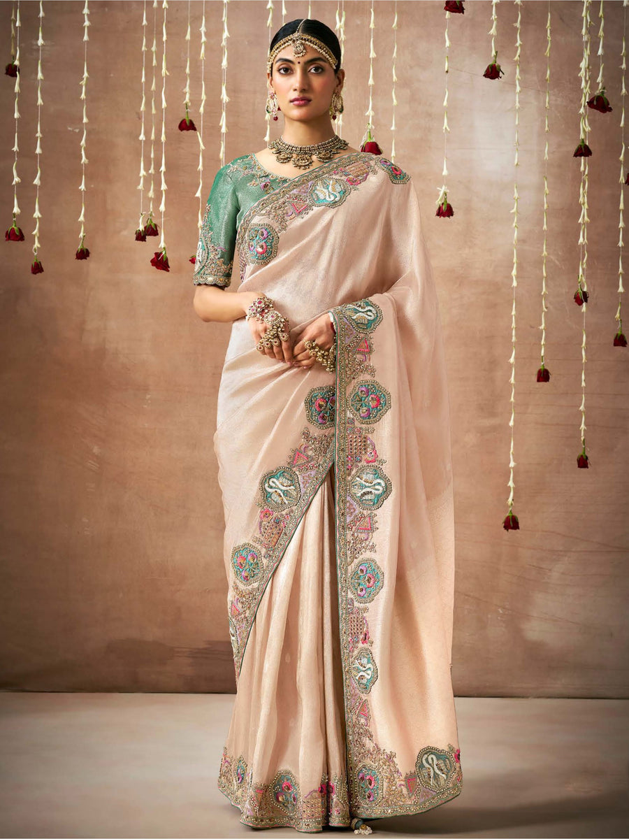 Green silk saree crafted for elegance and style.