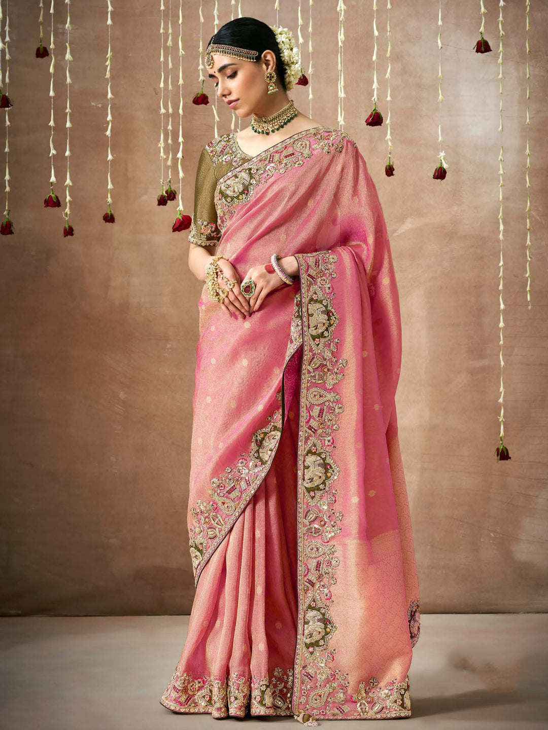 Pink silk saree crafted for elegance and style.