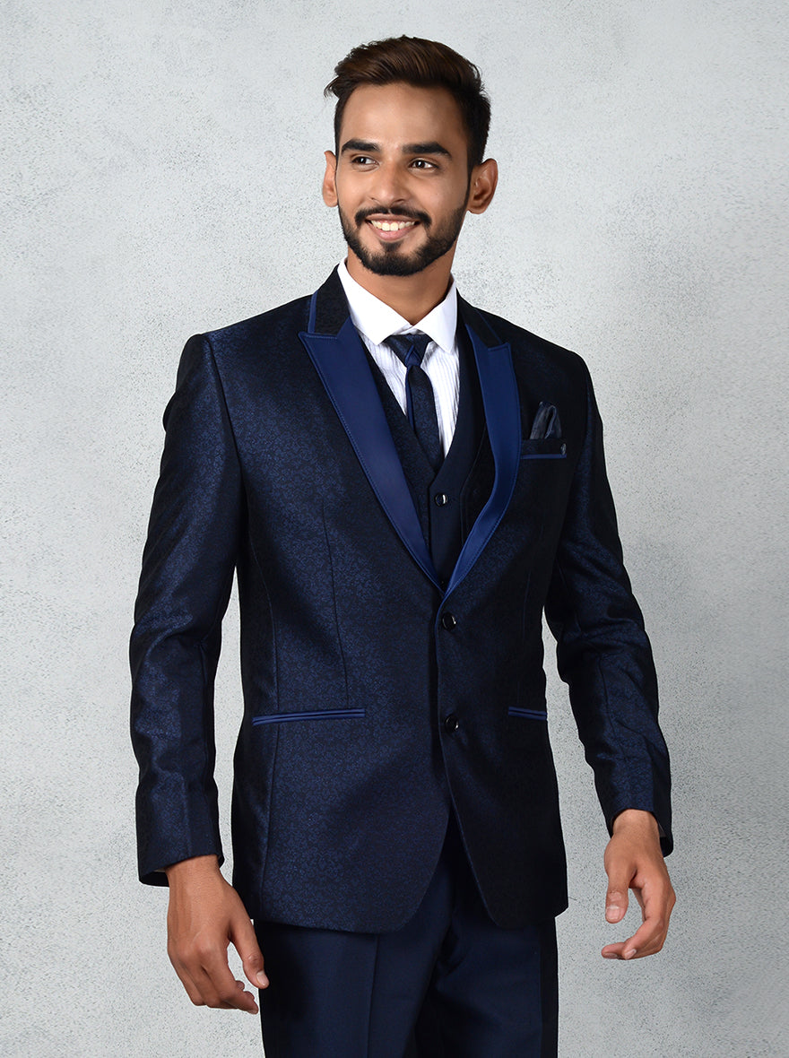 Comfortable navy tuxedo, perfect for formal occasions, featuring a stylish design that combines elegance and sophistication.