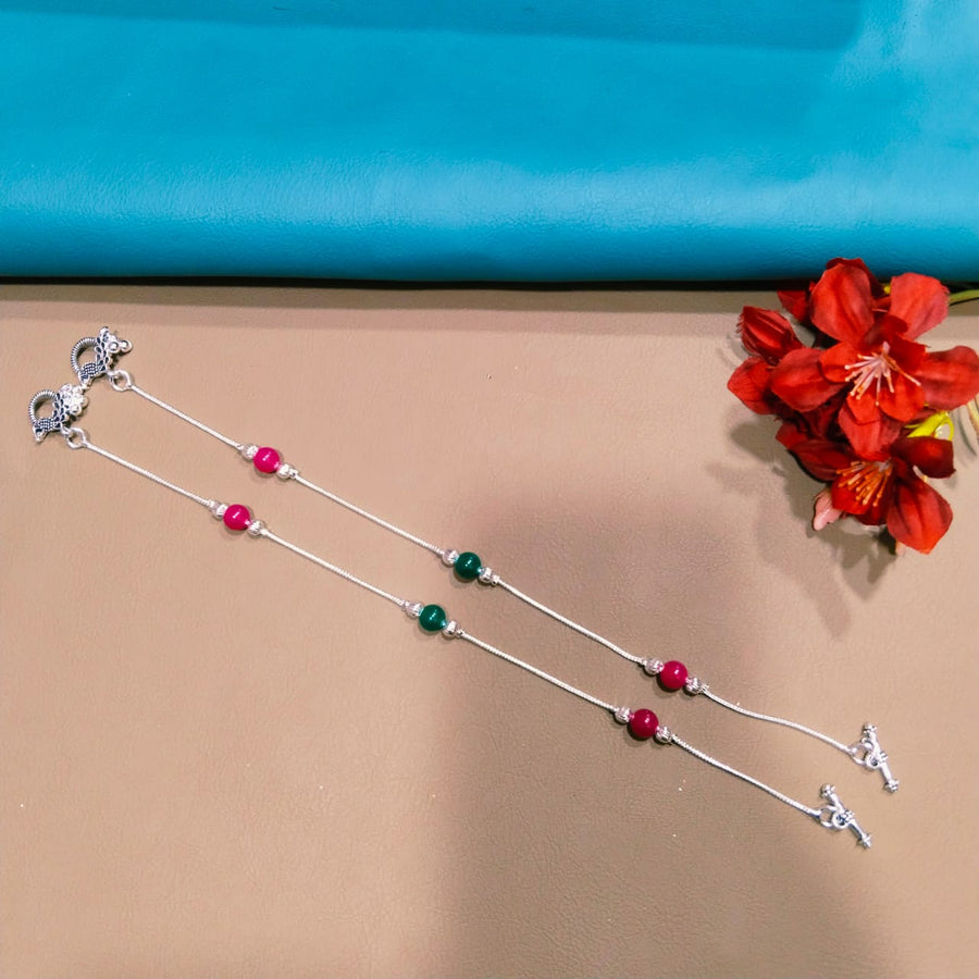 Adjustable silver anklet with custom charm, crafted for beach vacations and minimalist fashion.