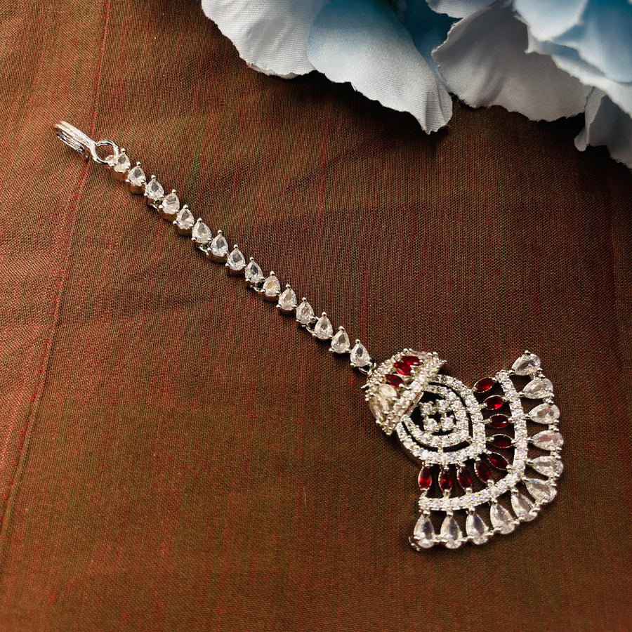 Gorgeous Silver AD diamond maang tika that captures the essence of bridal beauty.