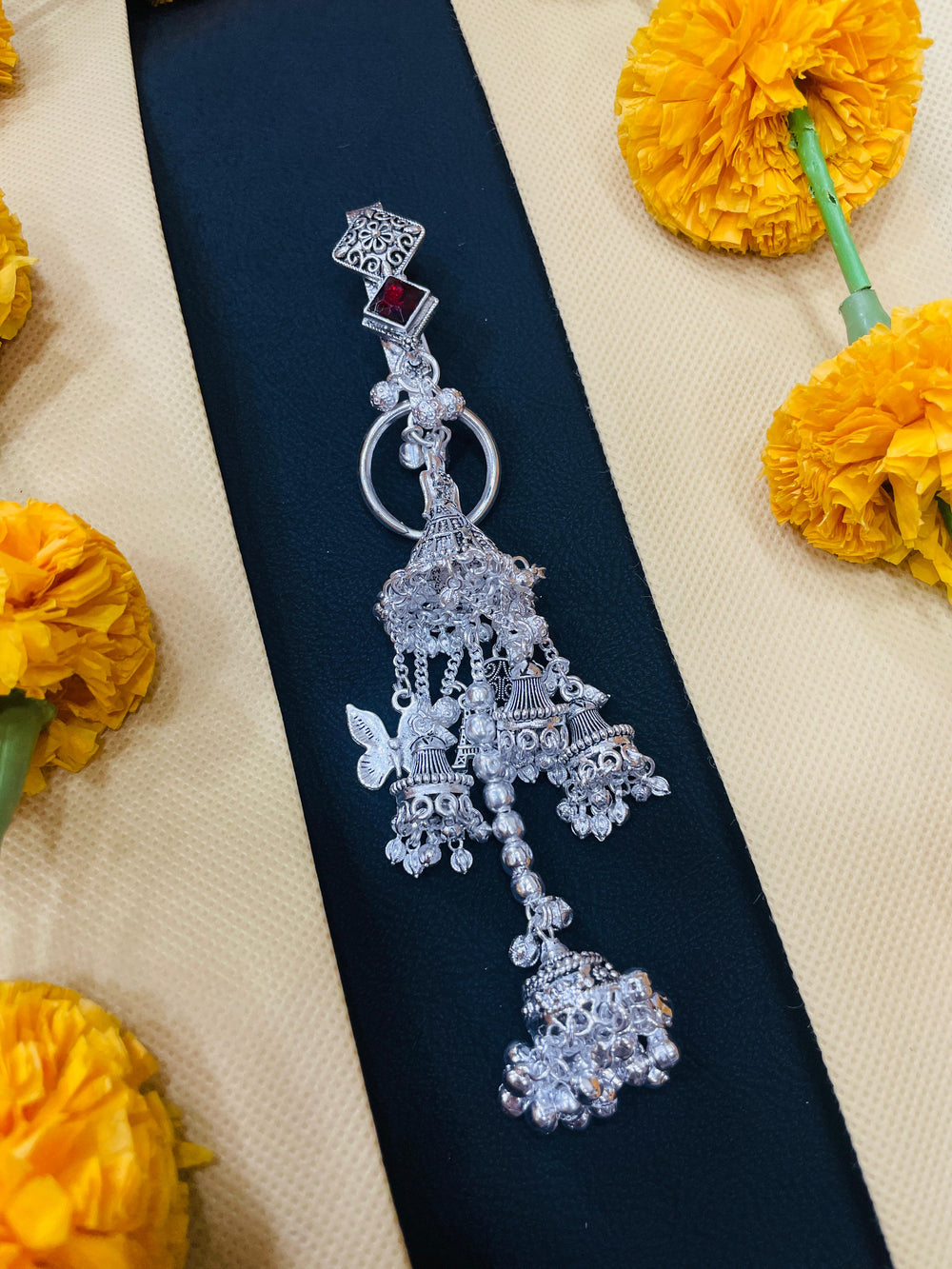 Elegant oxidised Juda, a traditional waist accessory for sarees.