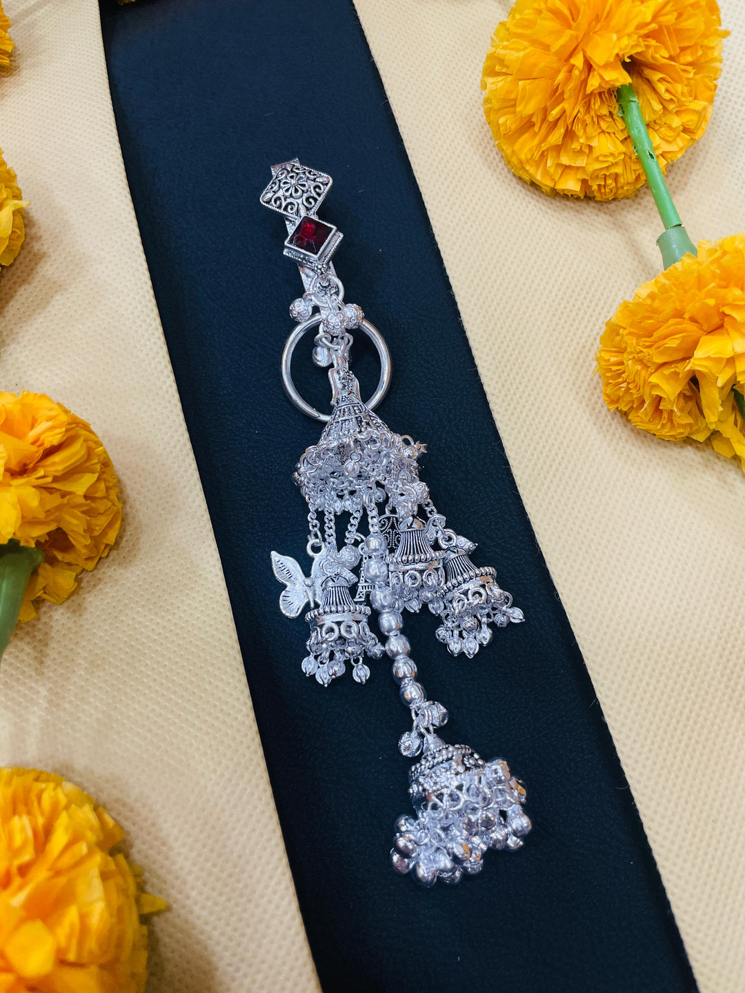 Elegant oxidised Juda, a traditional waist accessory for sarees.