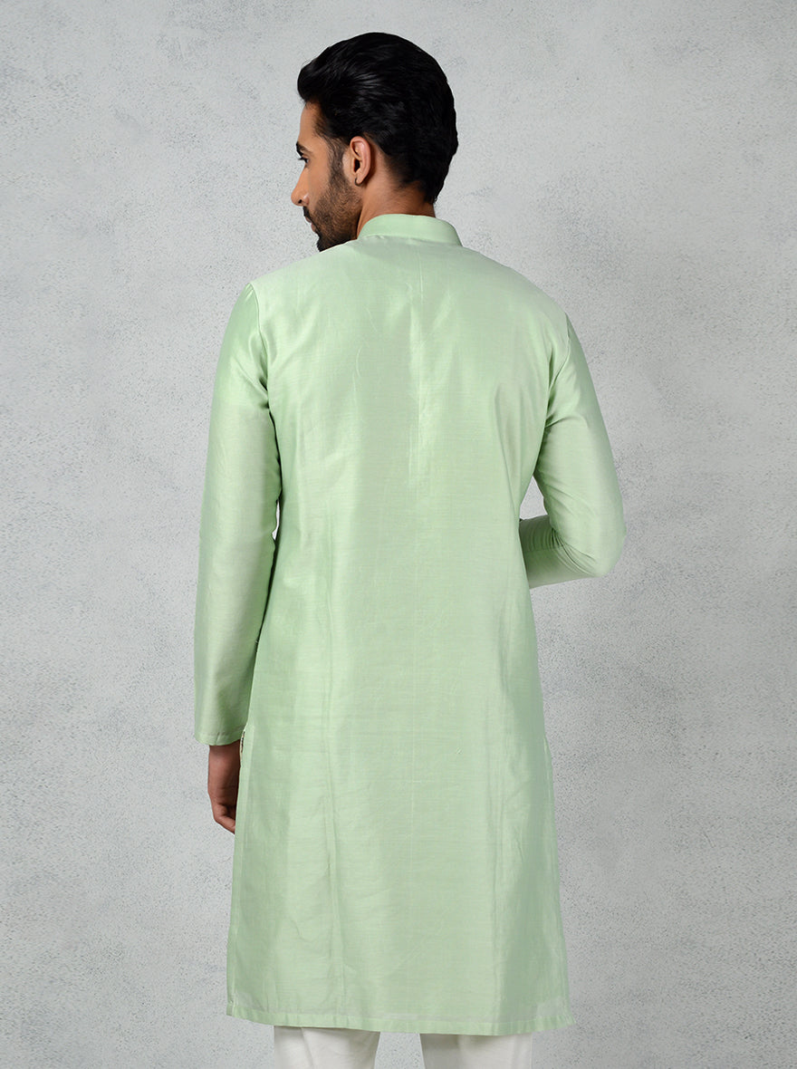 Elevate your ethnic wardrobe with this luxurious Pista Green Chanderi Silk Kurta Set.