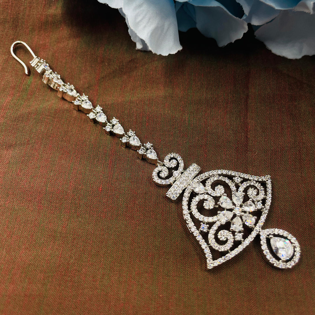 Stunning Silver AD diamond tika that enhances the beauty of traditional bridal attire.