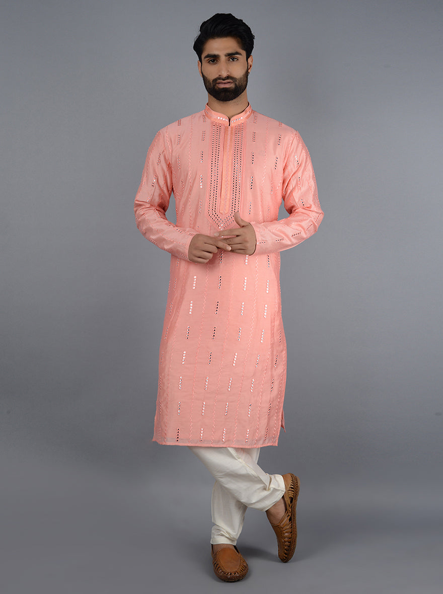 Luxurious silk blend kurta pajama featuring intricate embroidery.