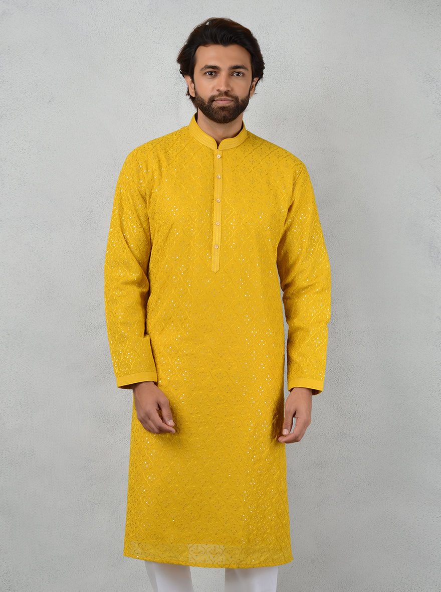 Celebrate in this elegant Yellow Silk Kurta Pajama set, crafted to honor traditions while showcasing modern style.