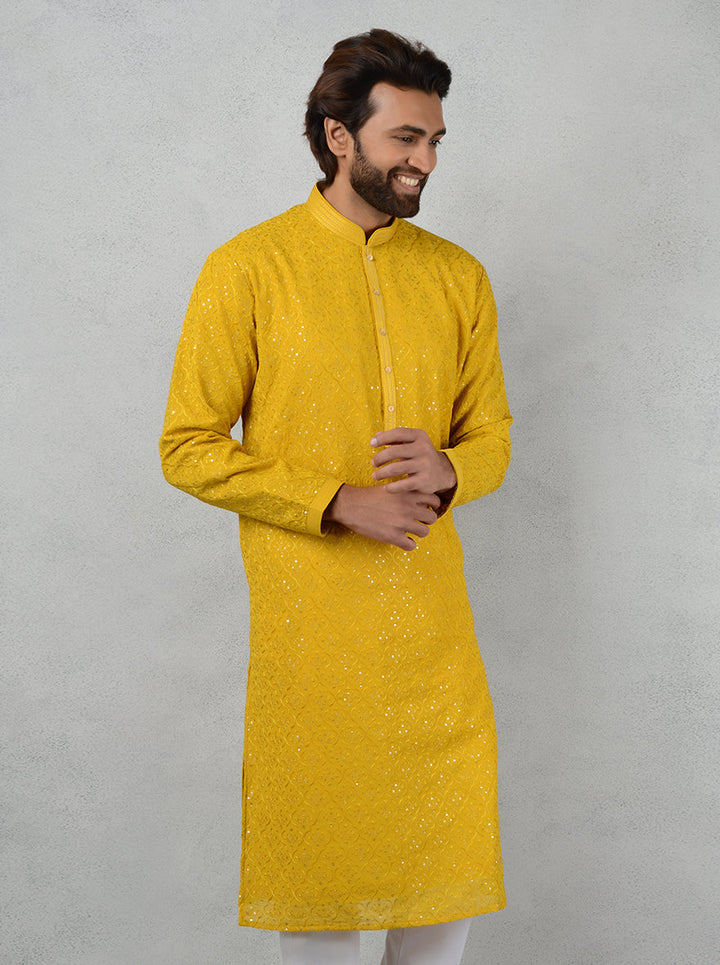 Shine at your Haldi ceremony with this stylish Yellow Silk Kurta Pajama, blending comfort and elegance perfectly.