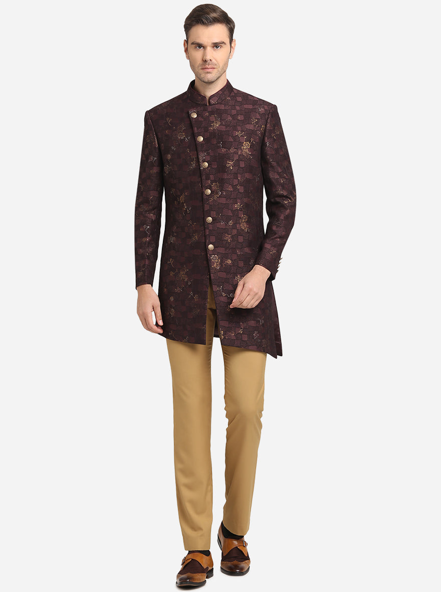 This dapper Deep Wine Indowestern outfit, featuring a coat and pant, is perfect for adding a touch of sophistication to your wedding look in the USA.