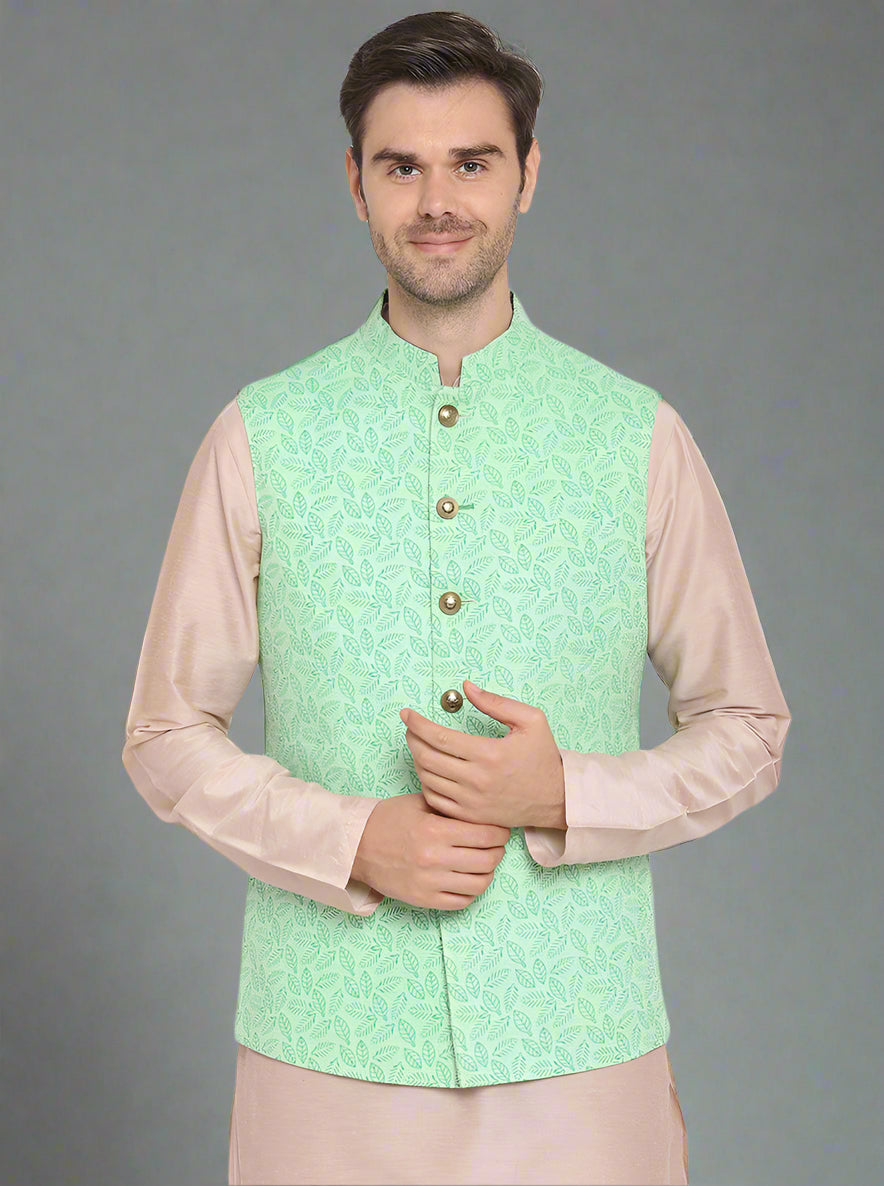 Stylish light-green waistcoat with pockets, perfect for adding versatility to your ethnic wardrobe.