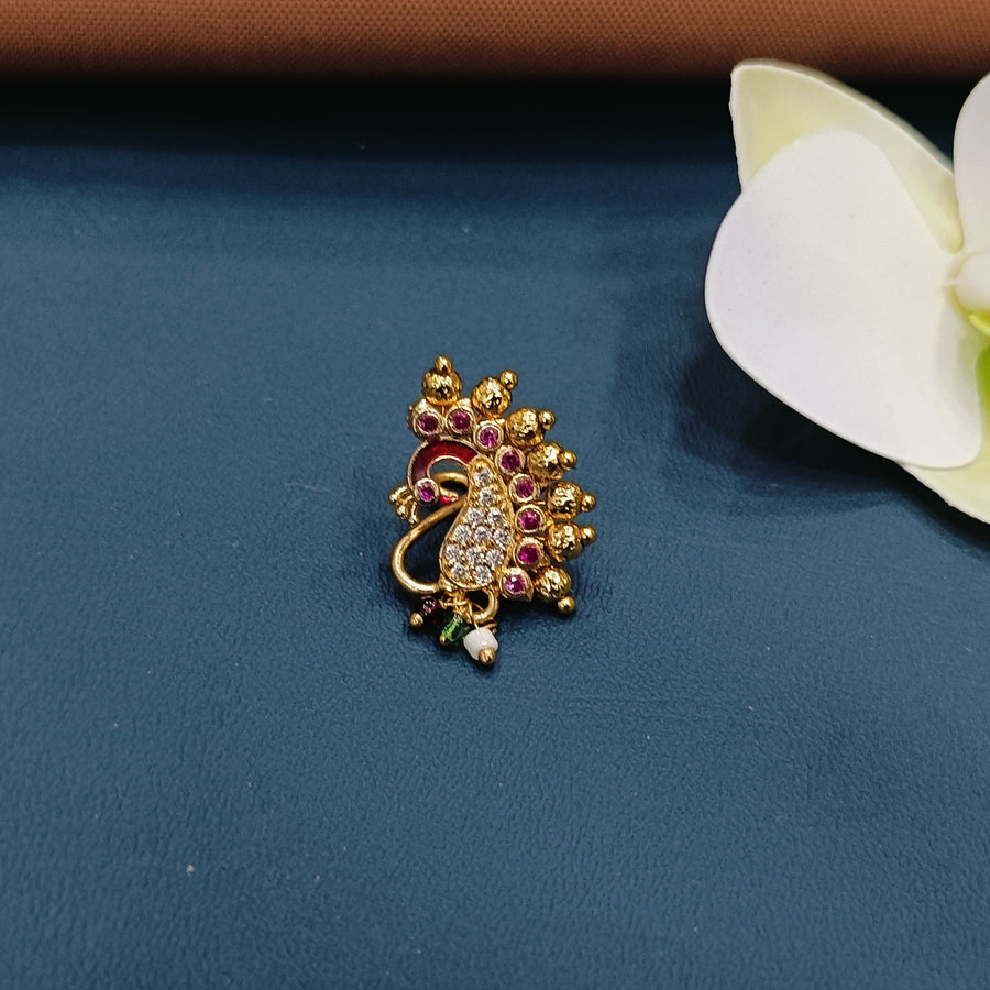 "Trendy kundan nose ring with a sophisticated look, ideal for formal wear."