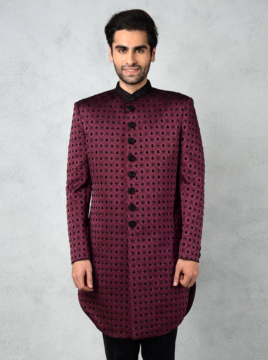 Discover the hand-beaded details of this wine Indo-Western outfit, ideal for weddings and celebrations in the USA.