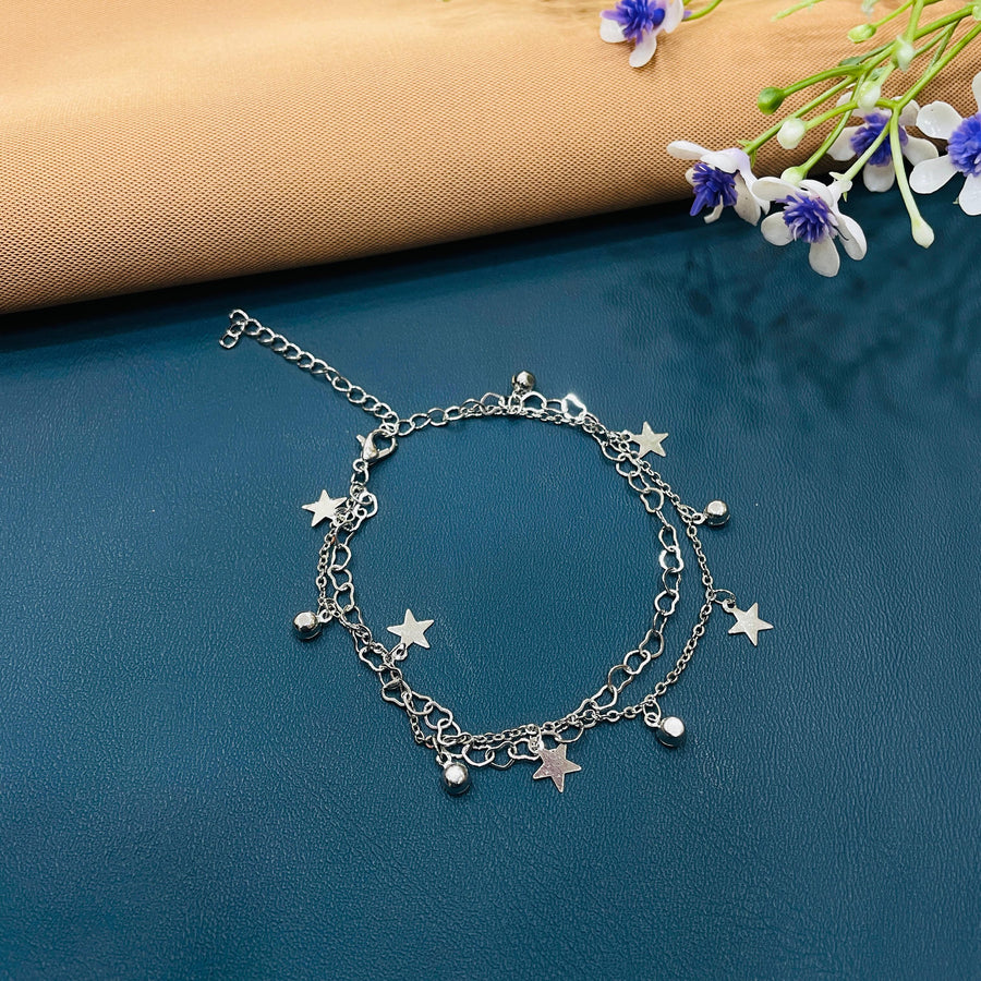 Dainty silver bracelet with delicate chain links, adding elegance to your look.