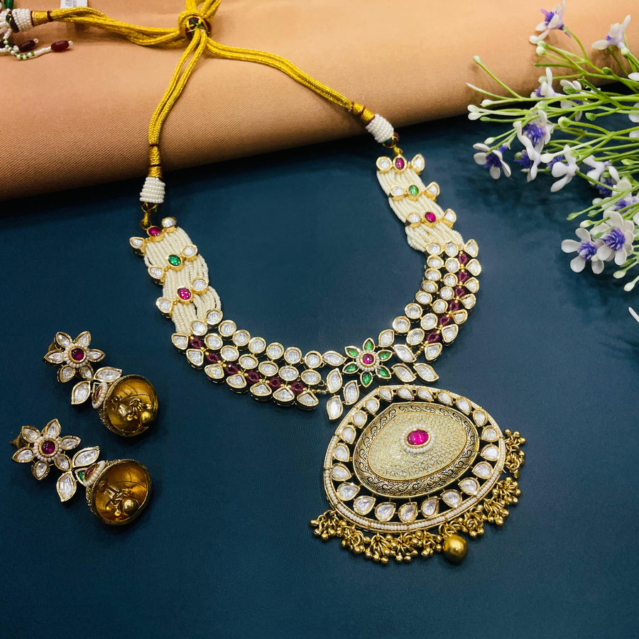 Gold choker with vintage-inspired Indian designs, ideal for adding elegance to bridal outfits.