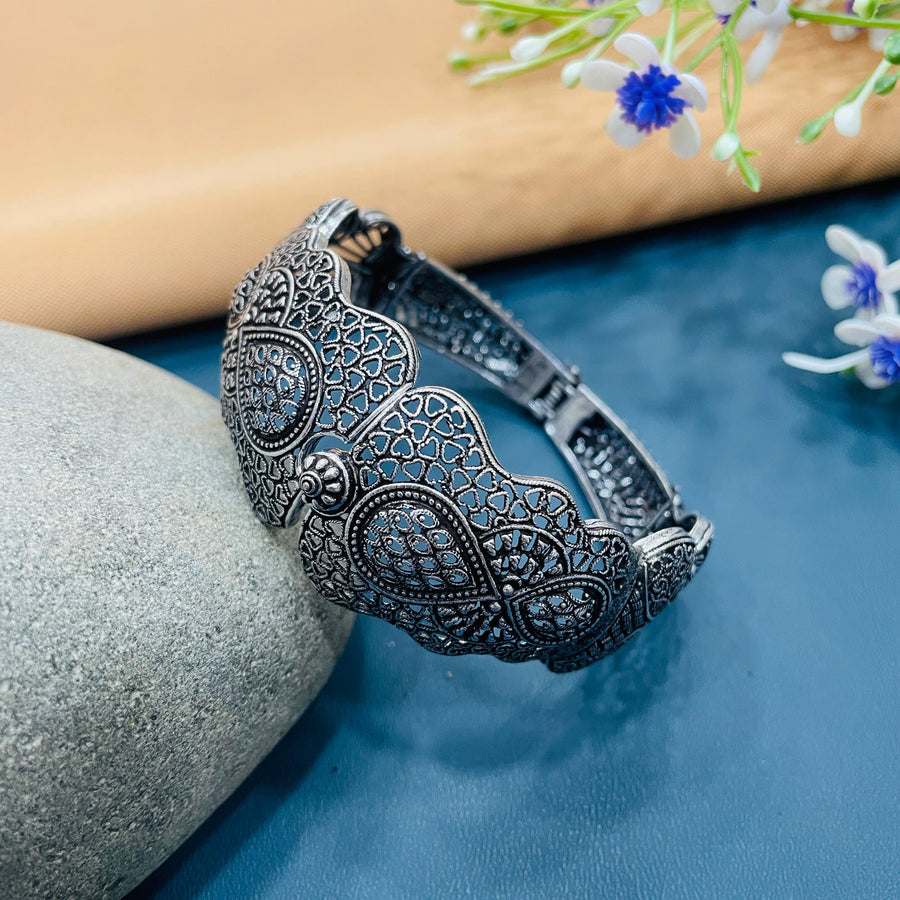 Vintage oxidised bracelet with gemstone accents, adding elegance to your collection.