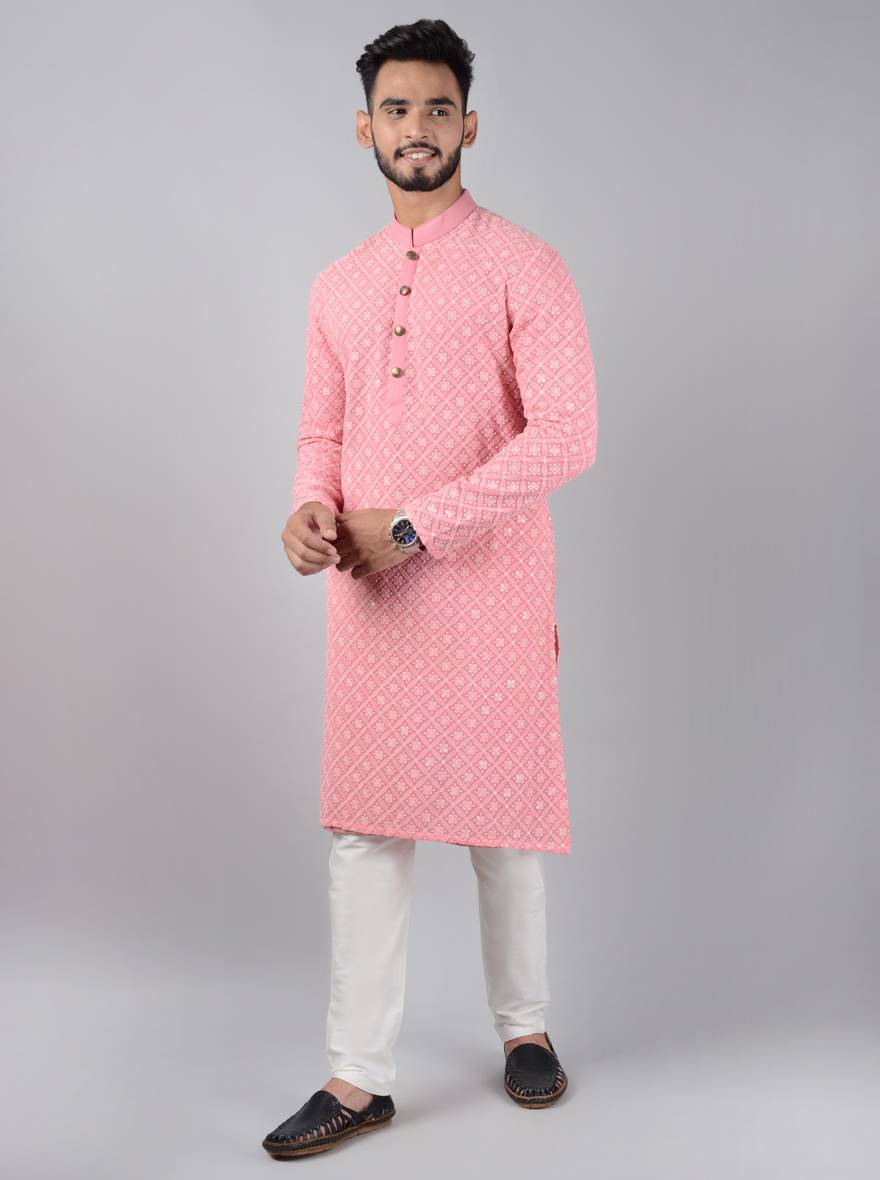 Elegant pink kurta set for USA men, featuring intricate embroidery.