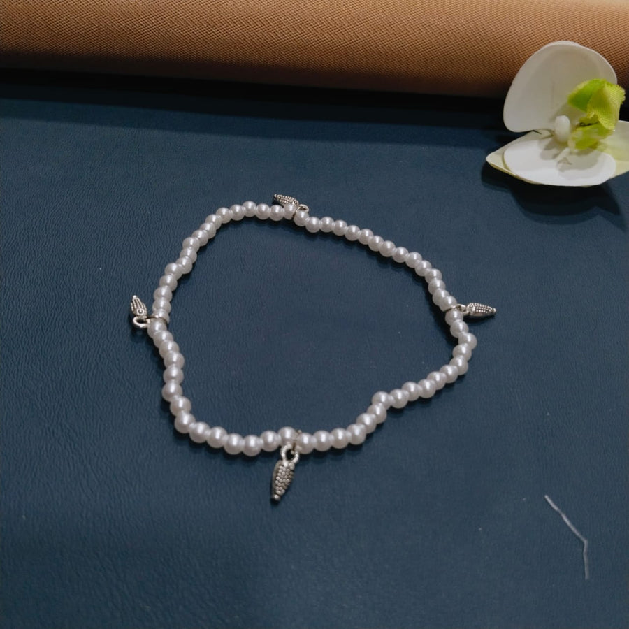 Boho silver anklet with beads, perfect for outdoor events or casual outfits.