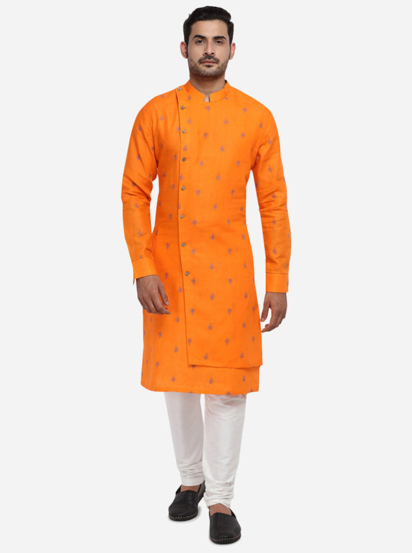 Chic embroidered orange kurta set for men, designed for fashionable outings.