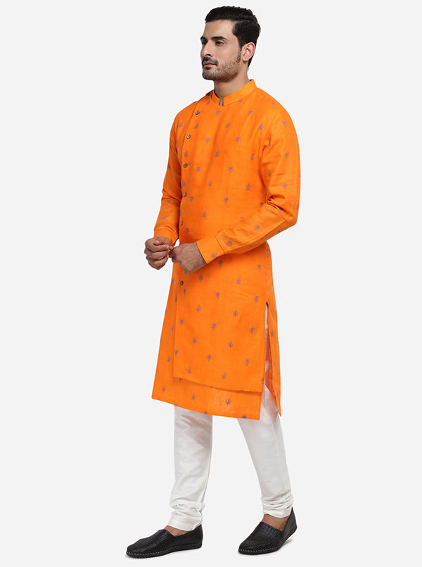 Stylish embroidered orange kurta set for men, crafted from comfortable cotton linen.