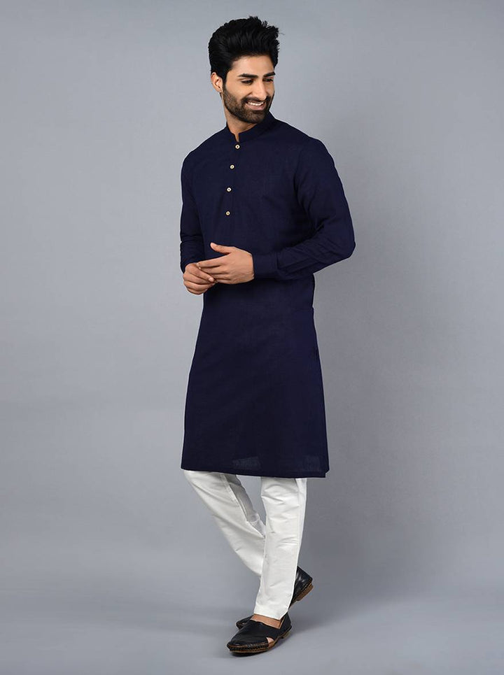 Experience luxury and style with our beautifully crafted navy blue kurta set for special events.