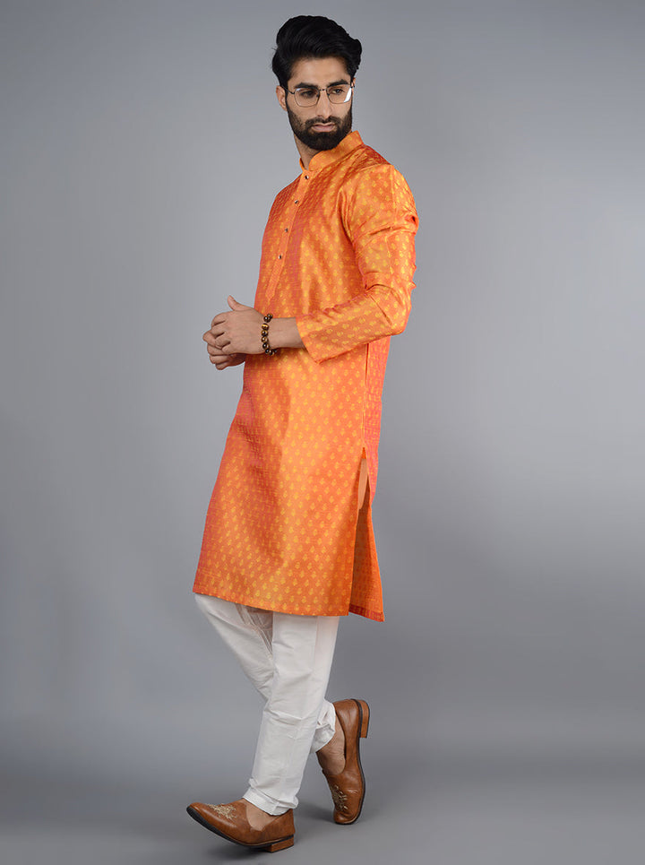 Stylish honey yellow kurta set featuring elegant embroidery for celebrations.