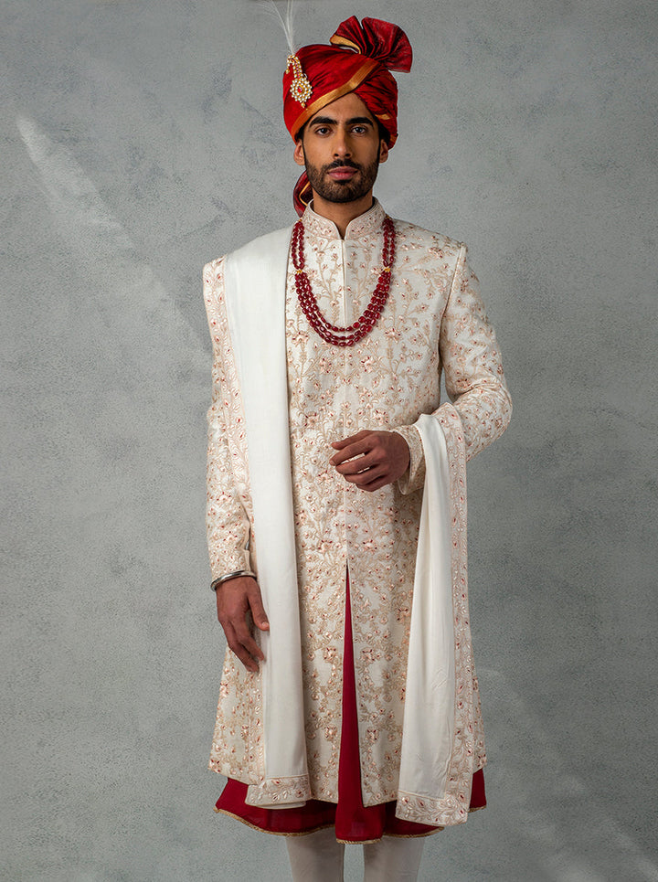 Shop now for this exquisite off-white sherwani, ideal for making a memorable impression on your wedding day.