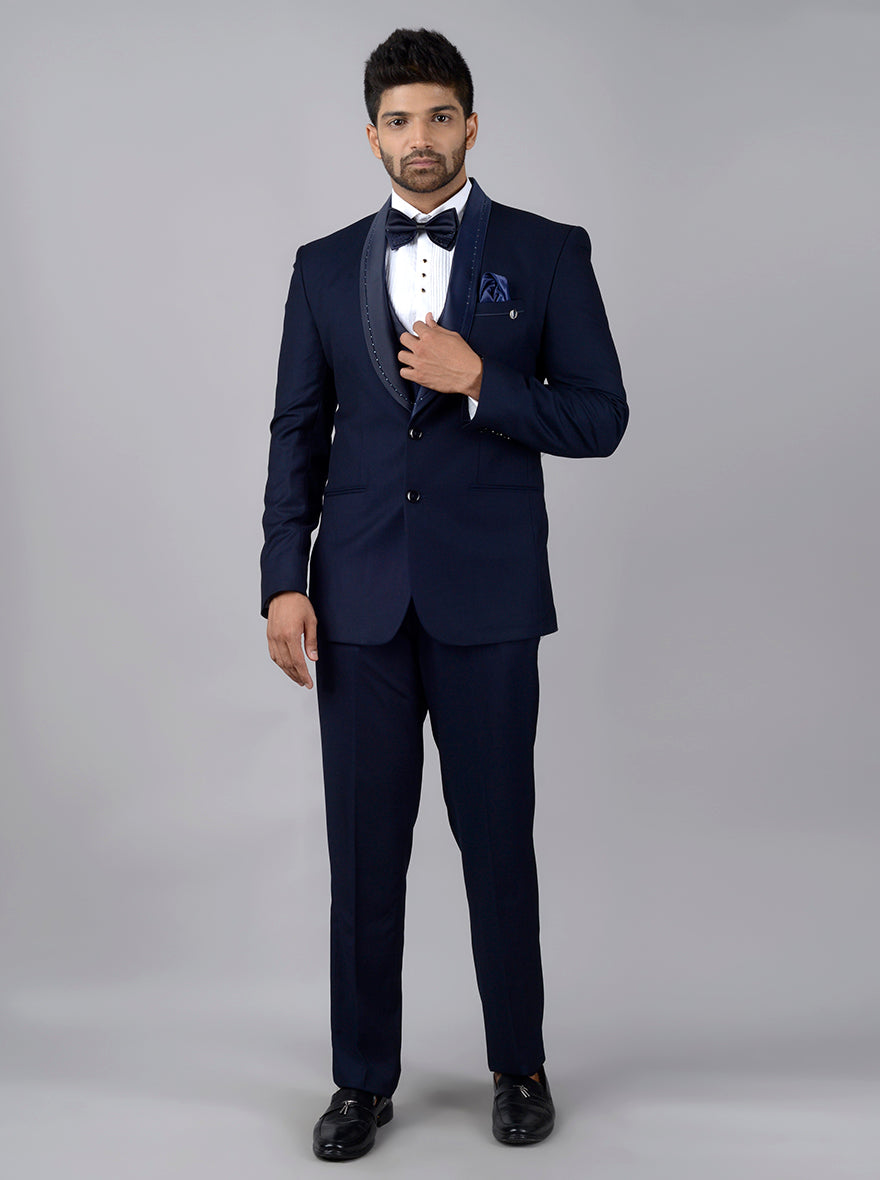 Stylish navy blue tuxedo for men, perfect for weddings or prom, providing a sophisticated and classic appearance.