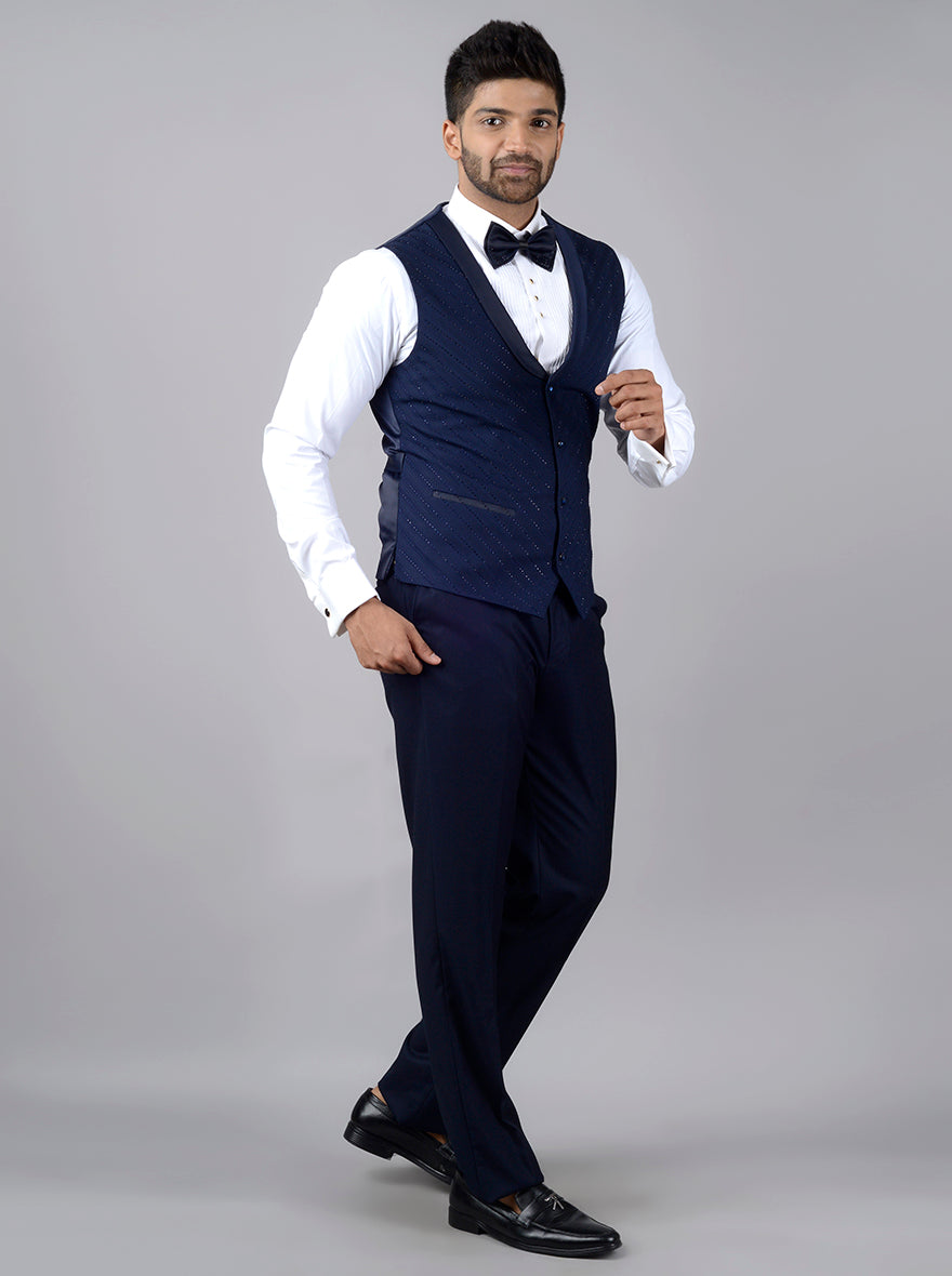 Classic navy blue tuxedo, ideal for grooms and special occasions, blending elegance with modern style for men.