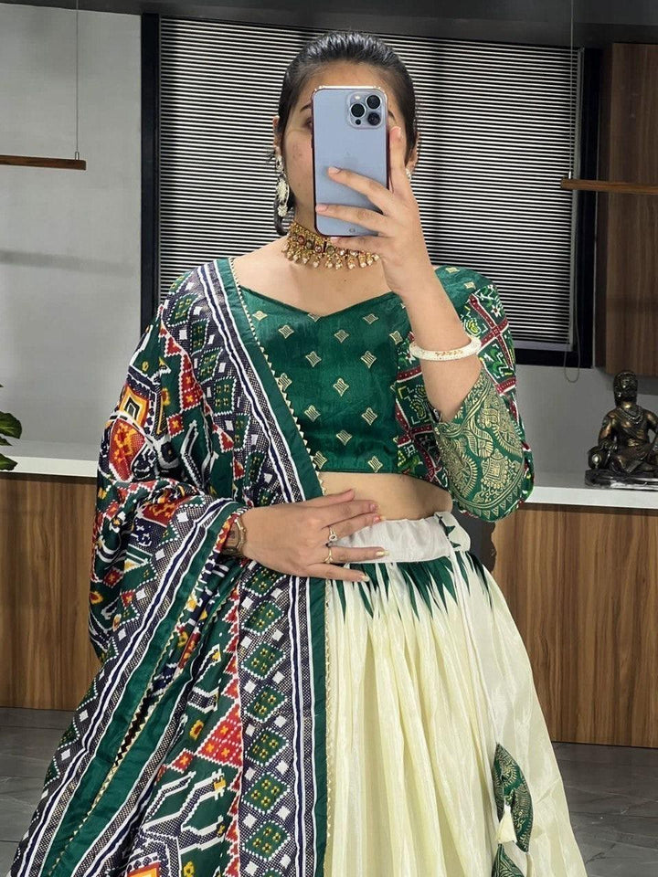 Elegant Patola Print Lehenga Choli | Off-White & Green Dola Silk Set