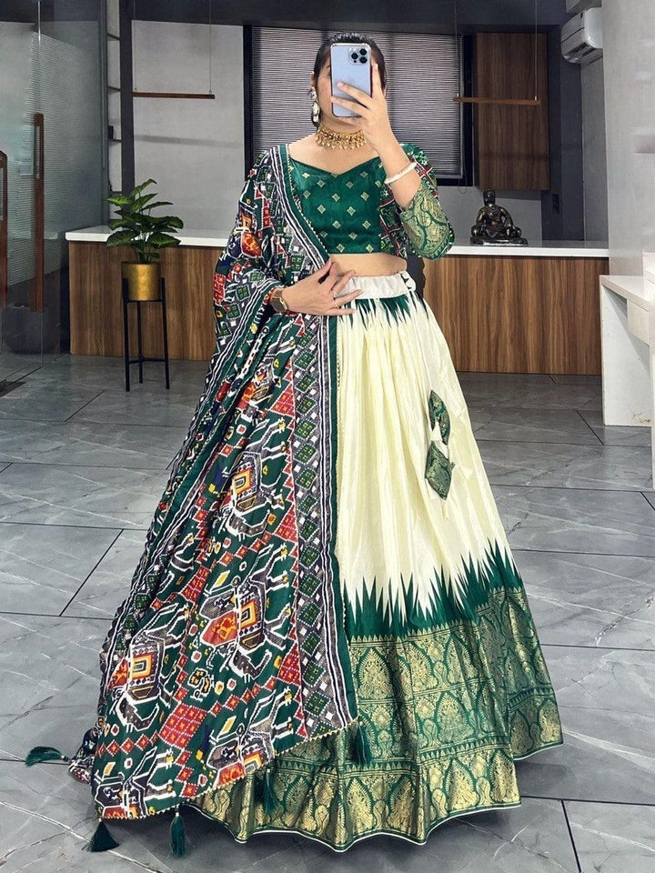 Elegant Patola Print Lehenga Choli | Off-White & Green Dola Silk Set