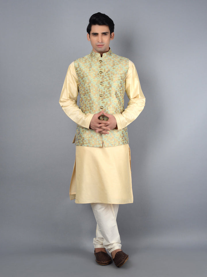 Regal golden pista Bandhgala jacket with unique self-design, ideal for weddings and formal celebrations.