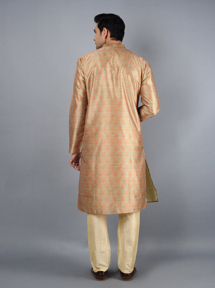 Eye-catching orange kurta set made from silk blend fabric, perfect for making a statement at festive gatherings in the USA.