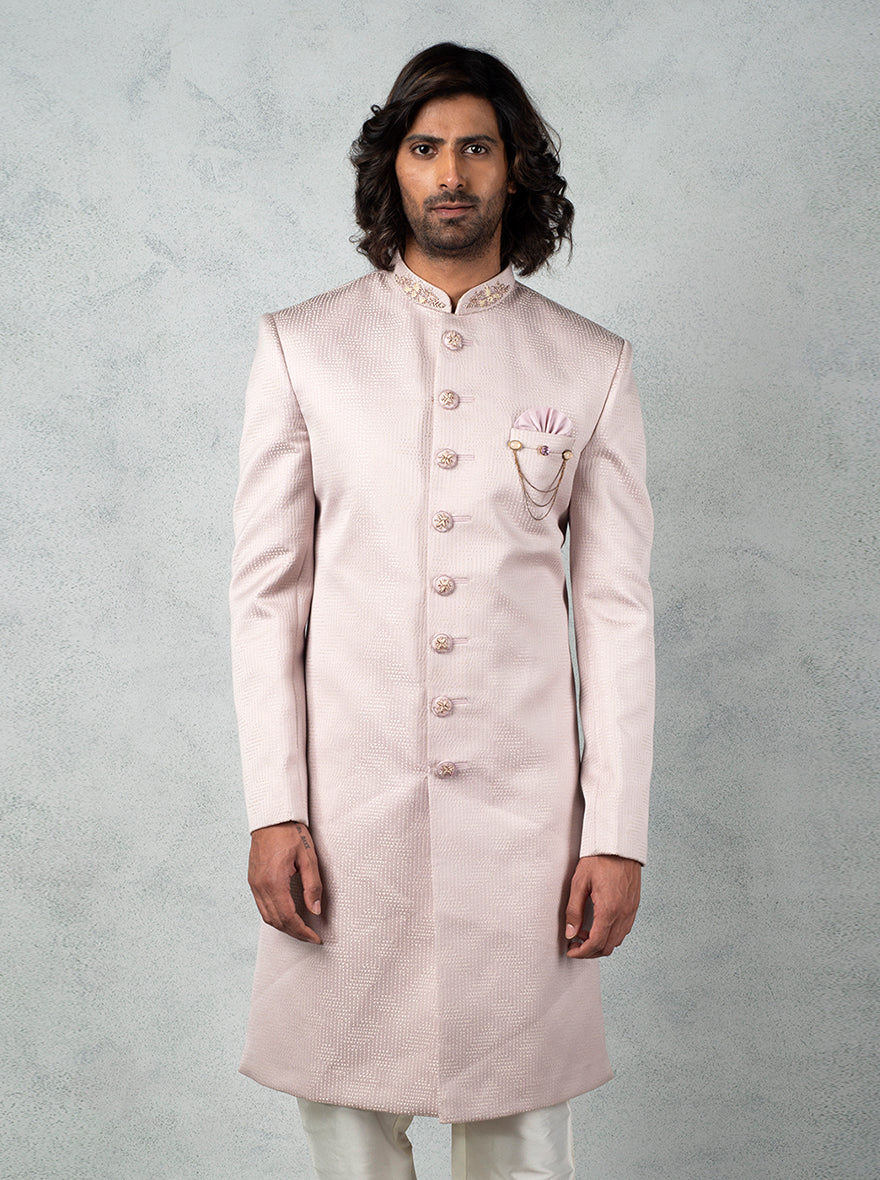 Ideal for the USA market, this Onion Pink Indo Western ensemble pairs well with a matching pocket square.