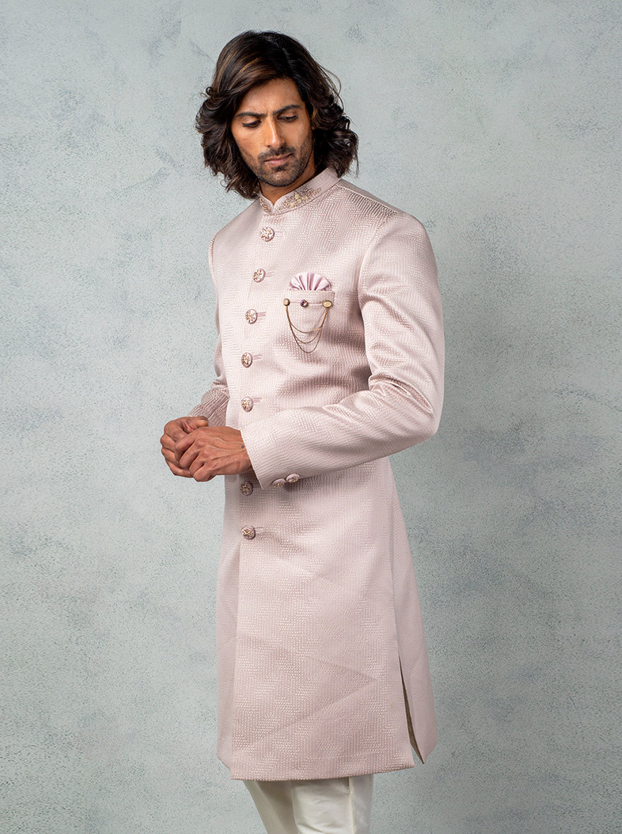 Elegant Onion Pink Indo Western dress with slim-fit trousers, embroidered stand, and pocket square.