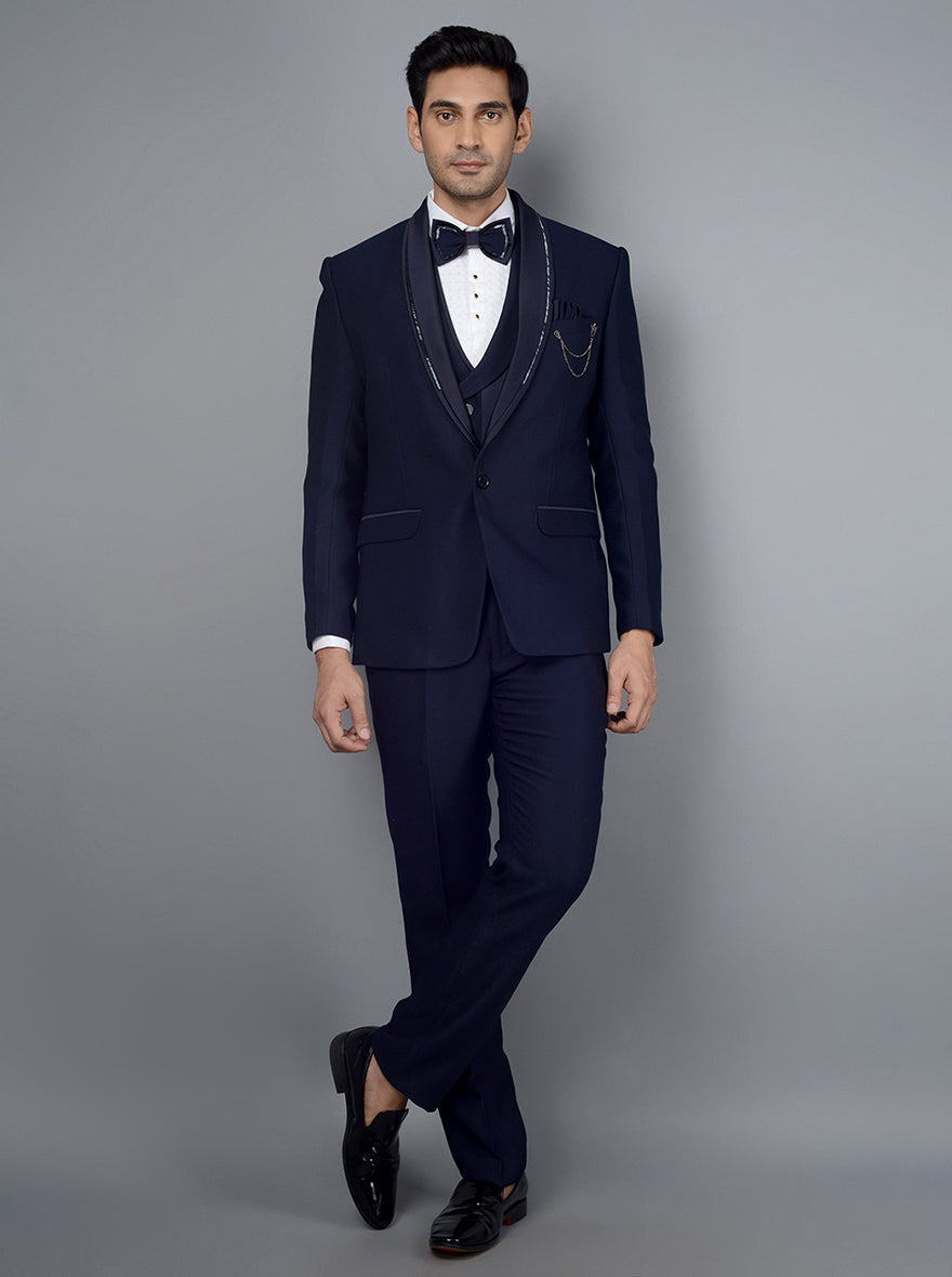 Stylish navy tuxedo designed for men, ideal for weddings and formal events, offering a timeless and refined look.