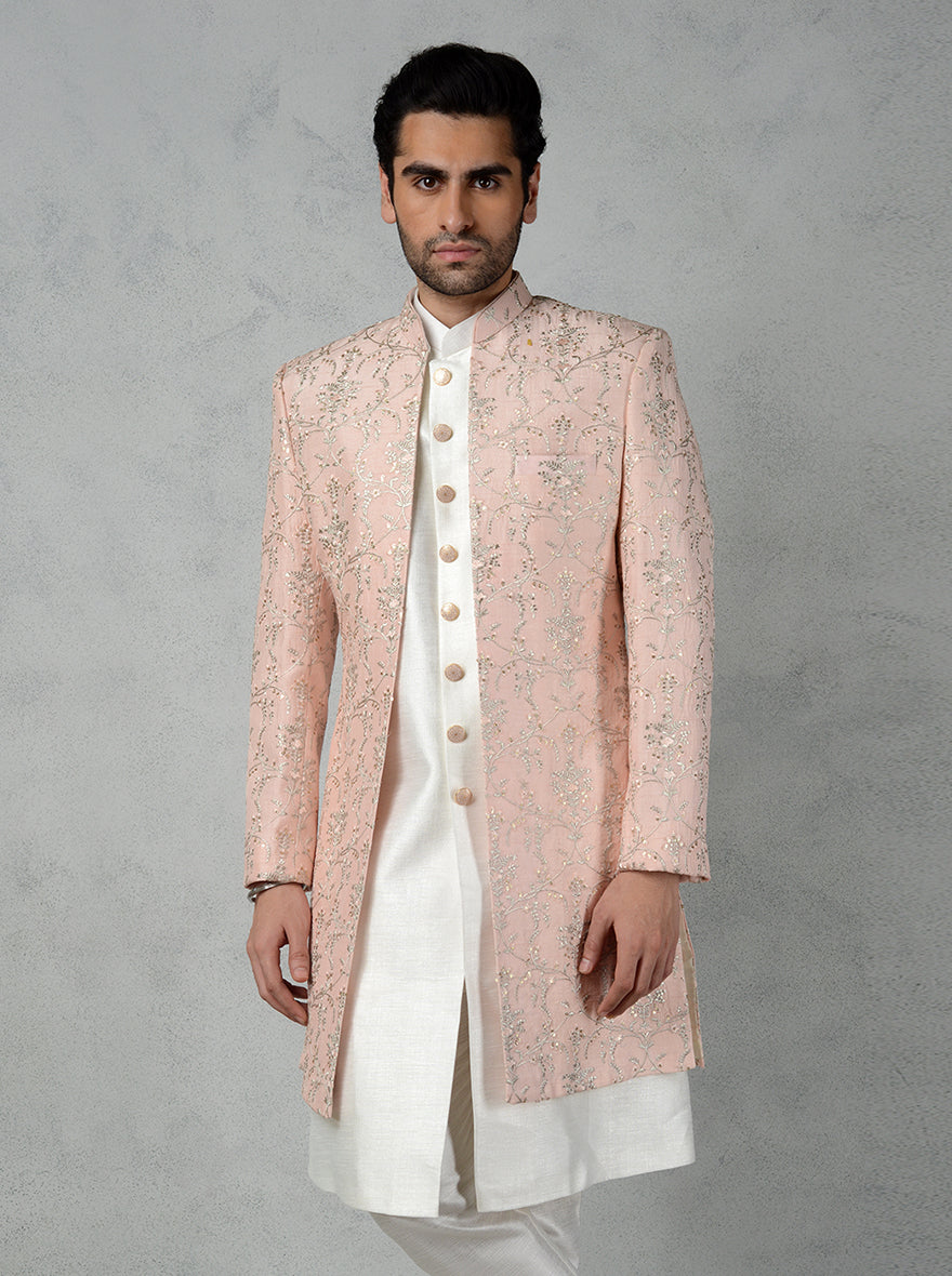 Elevate your ethnic style with this luxurious Peach Indo Western set, perfect for special events in the USA.