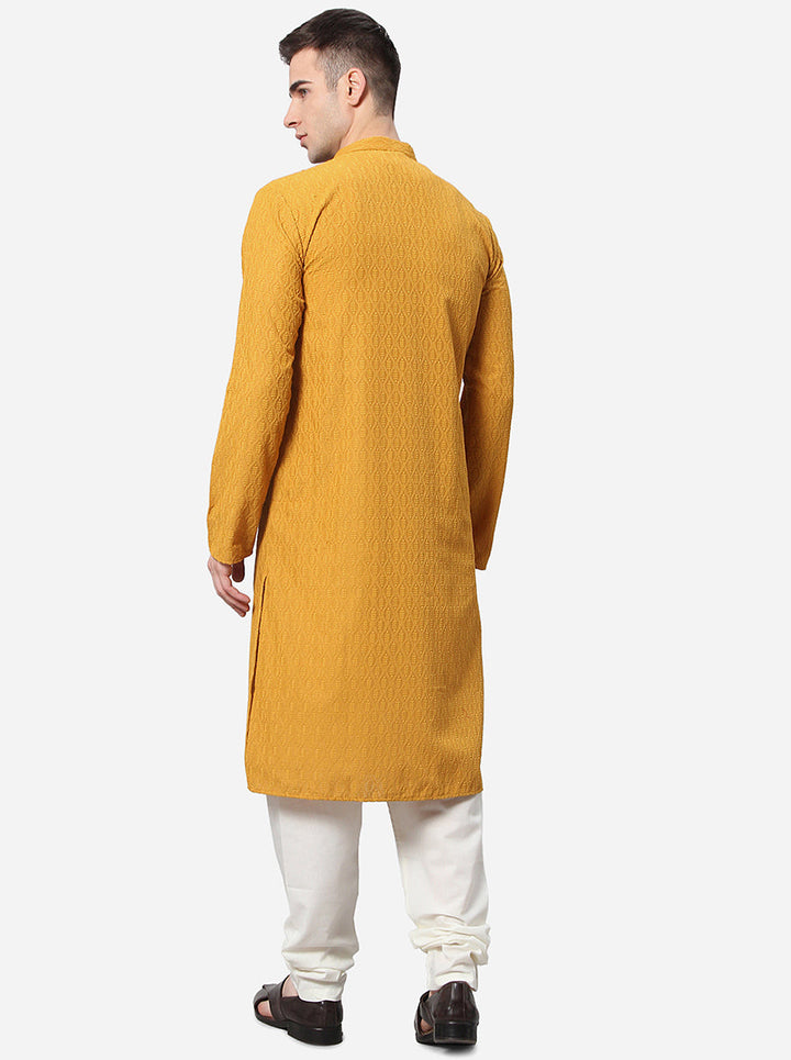 Stylish yellow men’s kurta set with white churidar, USA ethnic wear.