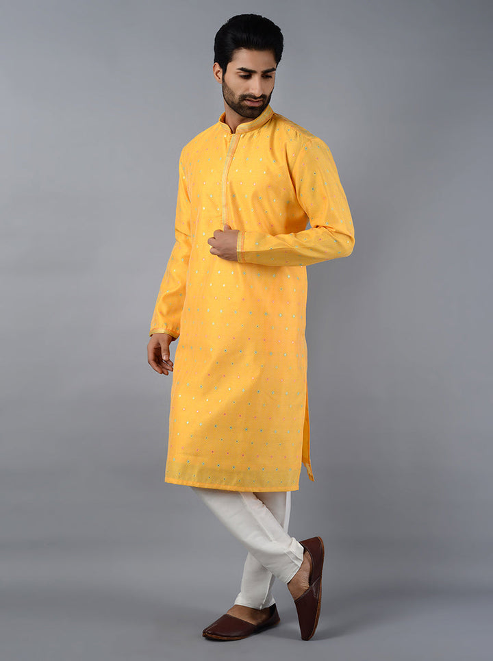 Elevate your traditional wardrobe with this cheerful yellow kurta set, perfect for modern festivities.