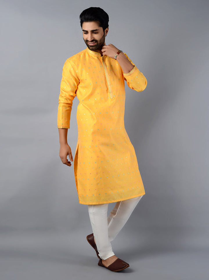 Celebrate in vibrancy with our eye-catching yellow kurta set for special occasions.