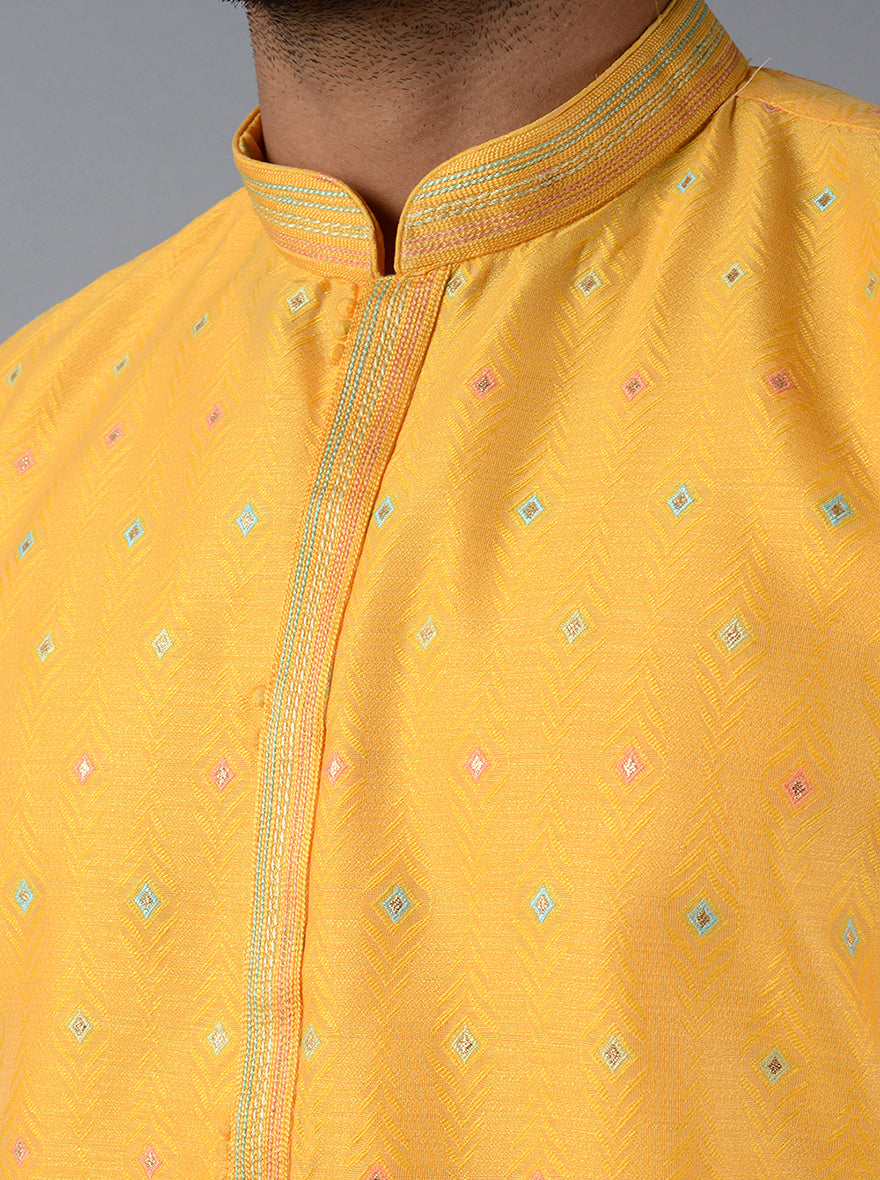 Make an impression at events with this stunning yellow kurta set.