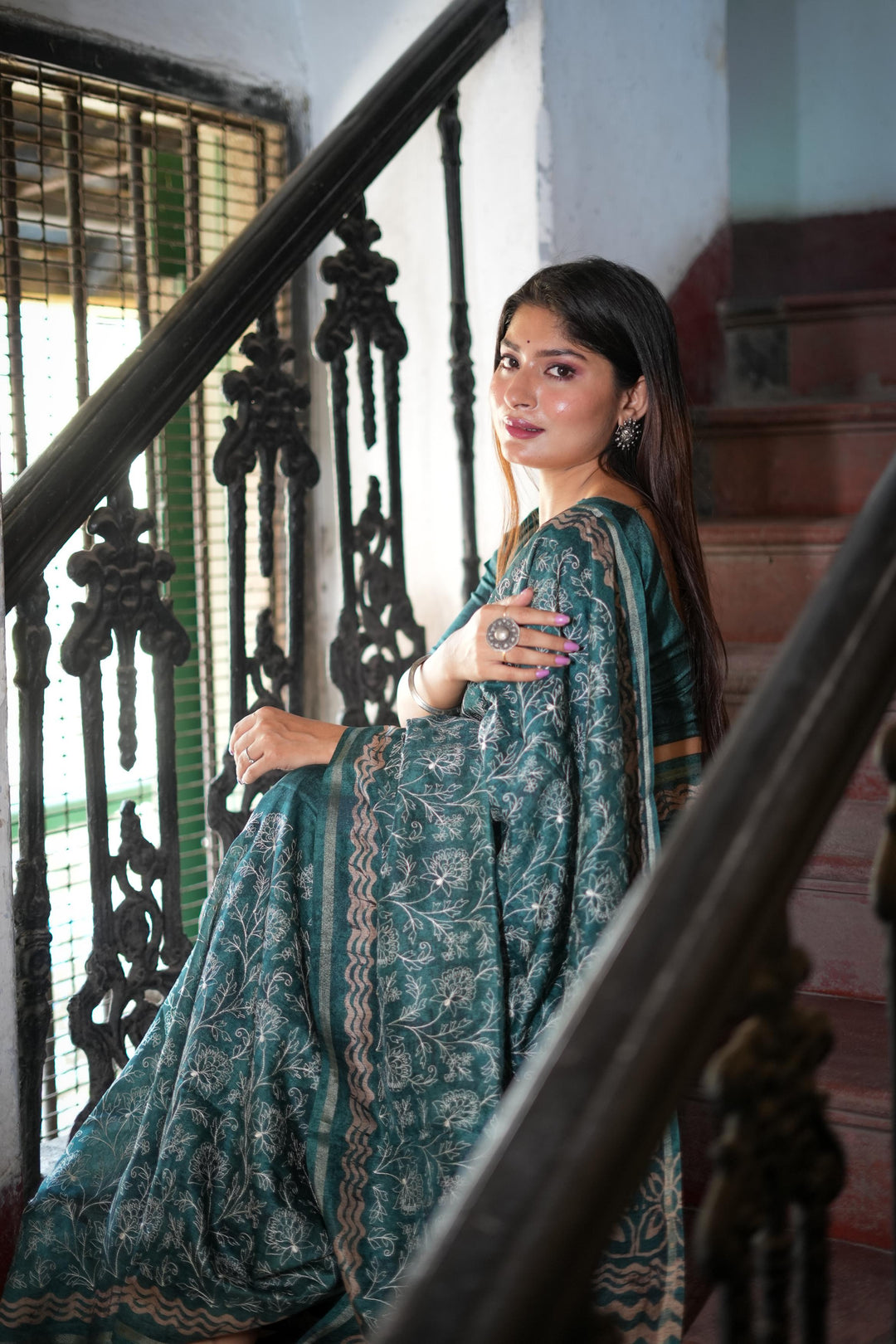 Elegant blue Tussar silk saree with a lovely batik border and fancy tassels, perfect for cultural and festive events.