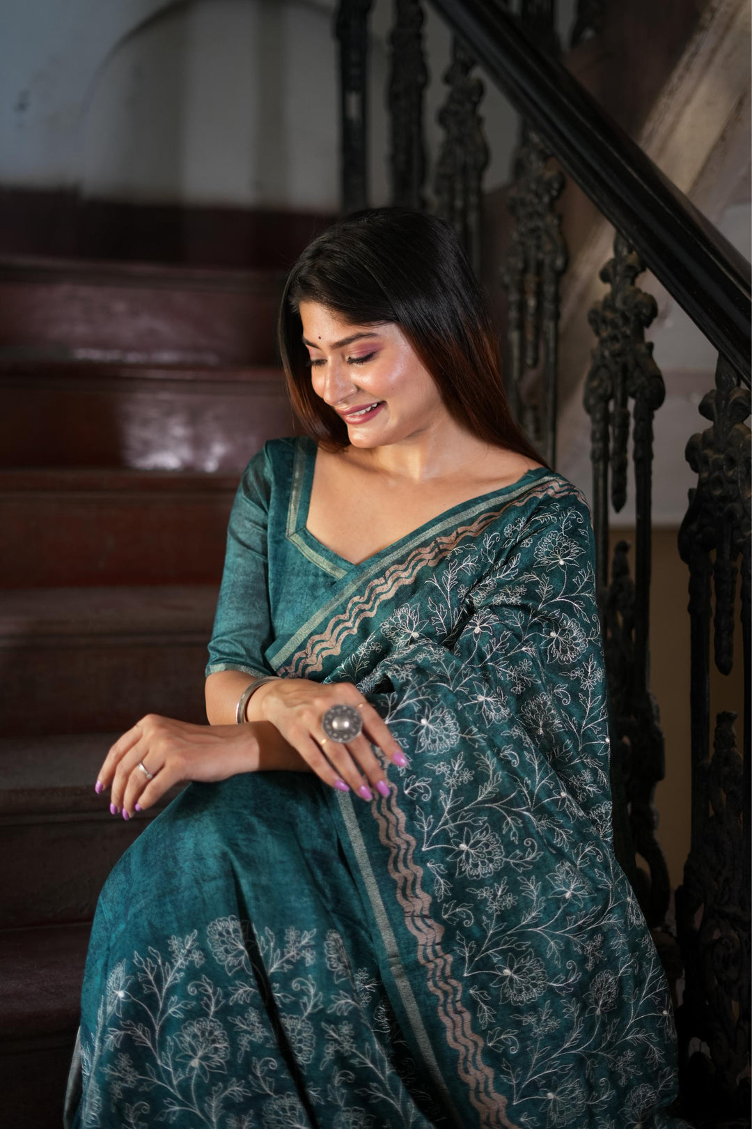 Gorgeous blue Tussar silk saree featuring a batik border and fancy tassels, perfect for weddings and celebrations.