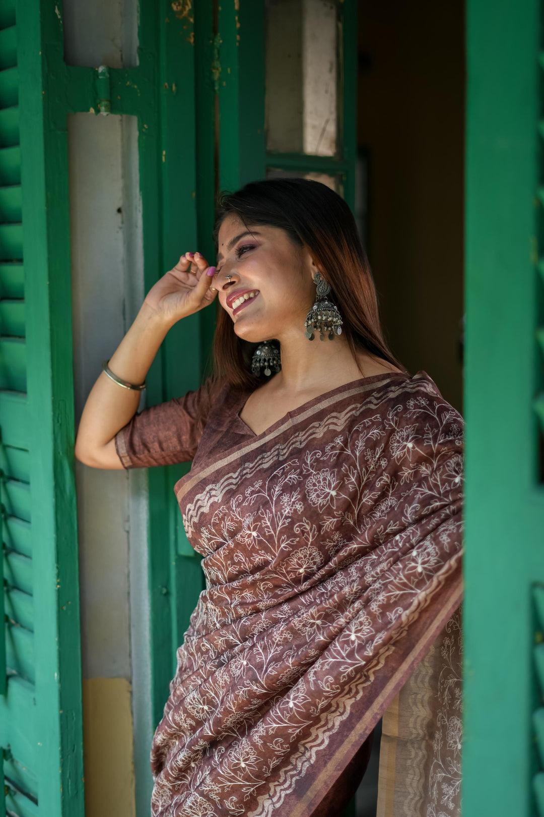 Beautiful green Tussar silk saree with exquisite batik border design and fancy tassels, perfect for festive wear.