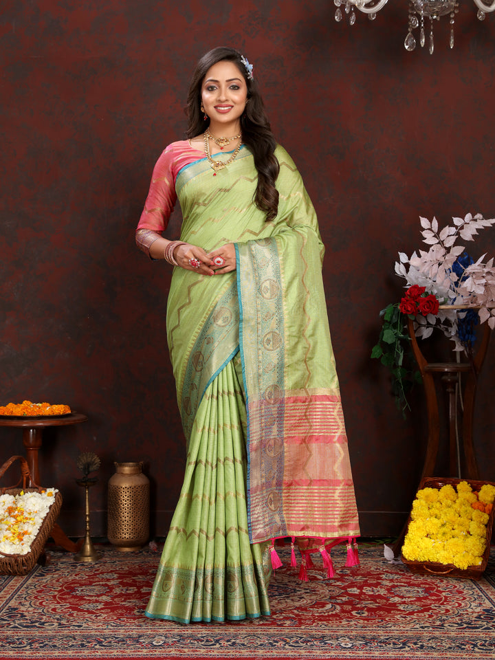 Pista-green silk saree with beautiful zari weaving, ideal for weddings and cultural events.