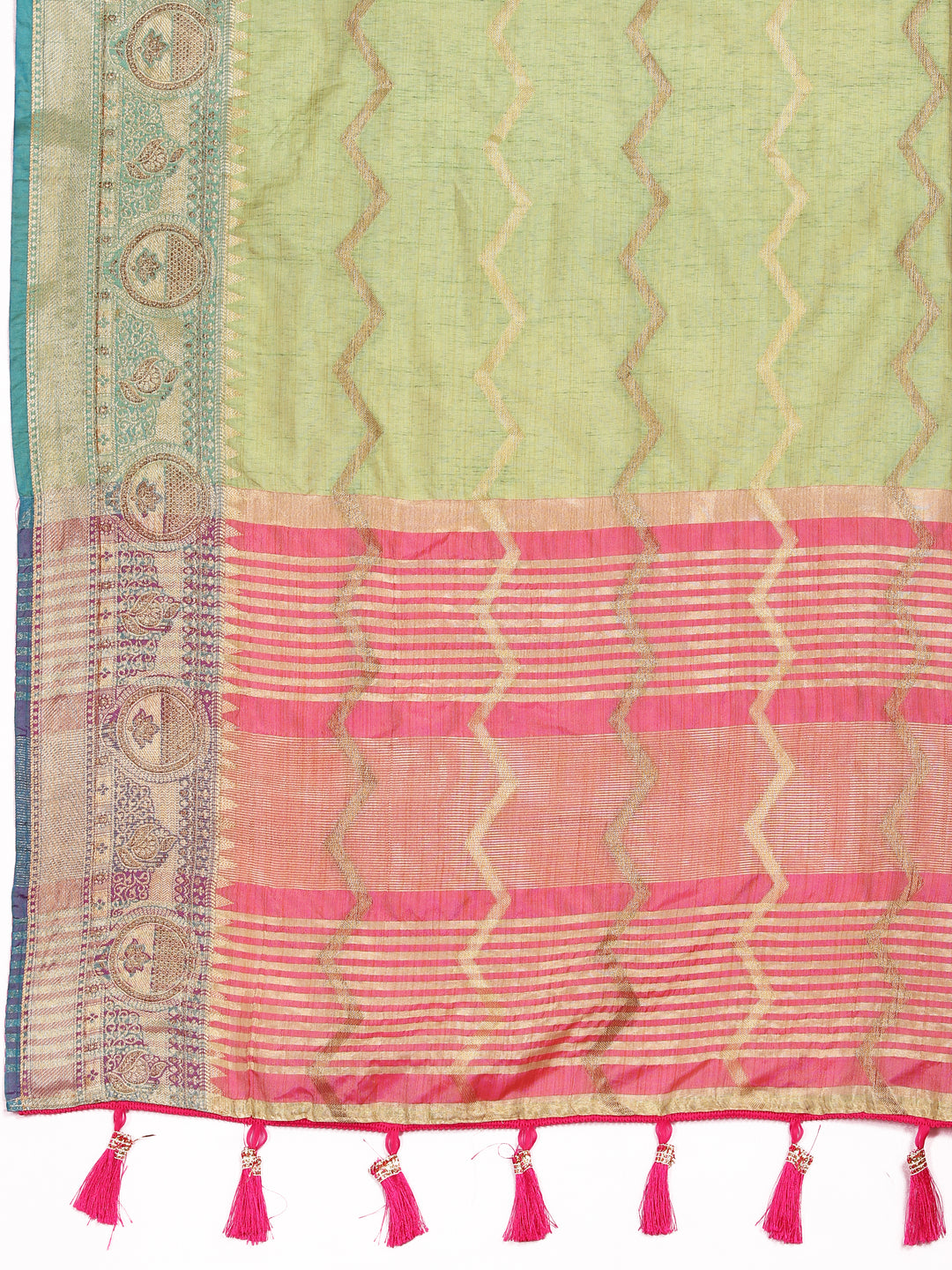 Designer pista-green silk saree featuring beautiful zari weaving, ideal for grand celebrations.