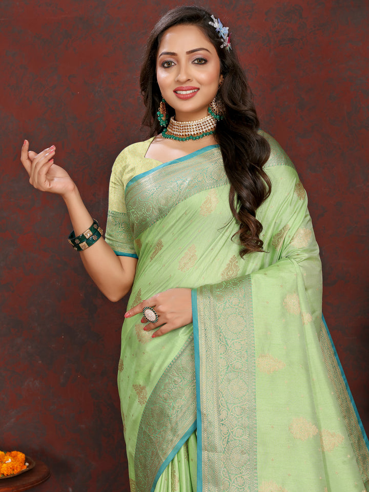 Timeless pista green Katan silk saree with delicate zari work on the pallu, perfect for elegant events.