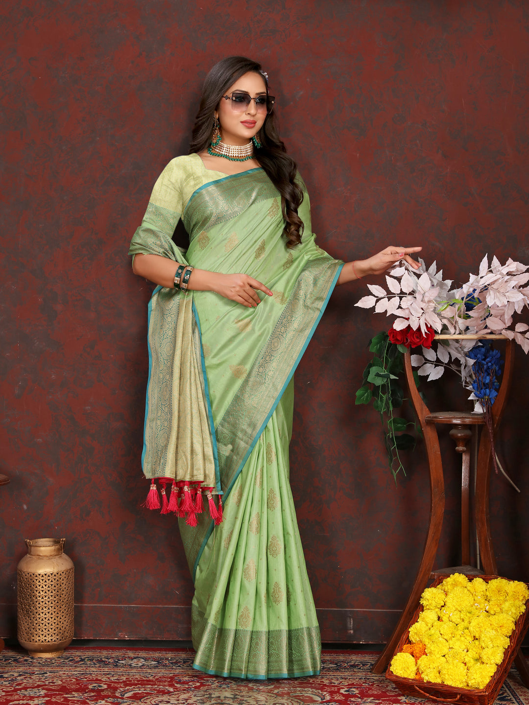 Stunning pista green Katan silk saree with intricate zari-adorned pallu, perfect for cultural gatherings.