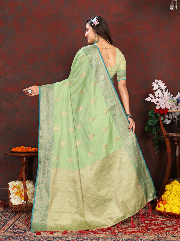 Graceful pista green soft Katan silk saree with exquisite zari detailing on the pallu, perfect for weddings.