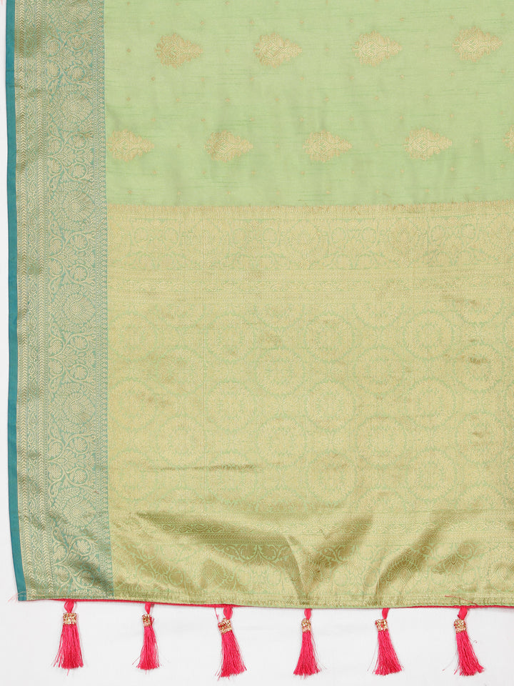 Classic pista green Katan silk saree featuring a graceful zari-adorned pallu, perfect for special occasions.