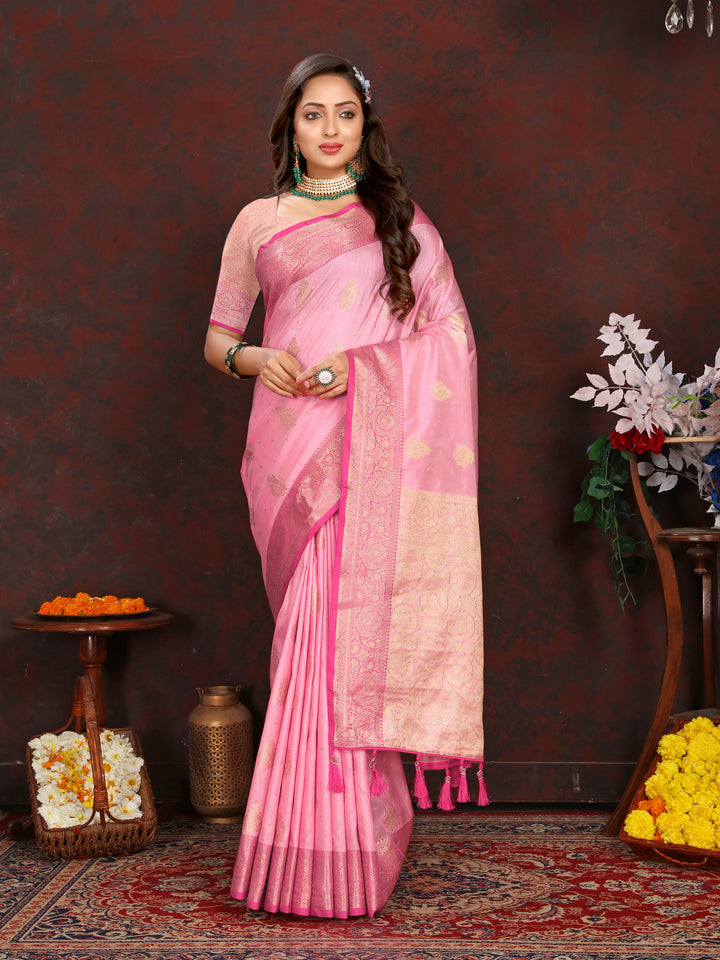 Beautiful pink Katan silk saree with intricate zari work on the pallu, perfect for weddings and traditional events.